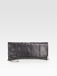 A glam style that combines textural boucle and python with chic silvertone hardware.Shoulder strap, 13½ dropMagnetic flap closureOne inner zip compartmentFully lined12½W X 5½H X ¾DMade in USA A glam style that combines textural boucle and python with chic silvertone hardware.Shoulder strap, 13½ dropMagnetic flap closureOne inner zip compartmentFully lined12½W X 5½H X ¾DMade in USA