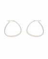 Traditional hoops with an up-to-date twist. Kenneth Cole New York earrings feature a modern pear-shaped hoop in silver tone mixed metal. Approximate diameter: 1 inch.