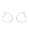 Traditional hoops with an up-to-date twist. Kenneth Cole New York earrings feature a modern pear-shaped hoop in silver tone mixed metal. Approximate diameter: 1 inch.
