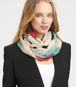 Luxurious cashmere/silk, in a whimsical balloon print, drapes softly at the neck or across the shoulders.70% cashmere/30% silkAbout 36 X 80Dry cleanImported