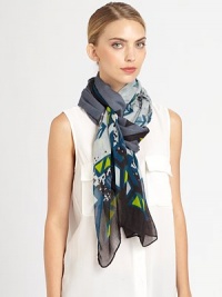 A hand-printed, colorful abstract print adorns a woven scarf.Viscose40 X 74Hand washImported