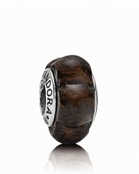 Scalloped carving brings added texture to this earthy wooded bead. Logo-engraved sterling silver trim displays the PANDORA signature. Scalloped carving brings added texture to this earthy wooded bead. Logo-engraved sterling silver trim displays the PANDORA signature.