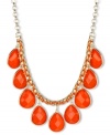 Soak up some sunny color. Haskell's frontal necklace brings focus to orange acrylic beads in a teardrop design. A tonal cord intertwines with a box chain. Crafted in gold tone mixed metal. Approximate length: 17 inches + 3-inch extender. Approximate drop: 1-1/2 inches.