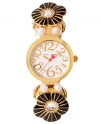 A dark take on floral style, this Betsey Johnson watch adds mystery to your look. A dark take on floral style, this Betsey Johnson watch adds mystery to your look.
