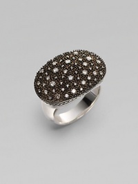 From the Starlight Collection. Radiant diamond speckles lay scattered on an impressive oval bed of black rhodium studs and dramatically set on a band of polished sterling silver. Diamonds, 0.65 tcw Black rhodium and sterling silver Length, about 1 Width, about ¾ Made in USA From the Starlight Collection. Radiant diamond speckles lay scattered on an impressive oval bed of black rhodium studs and dramatically set on a band of polished sterling silver. Diamonds, 0.65 tcw Black rhodium and sterling silver Length, about 1 Width, about ¾ Made in USA