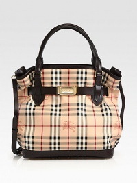 An iconic, haymarket check print on coated canvas accented with smooth leather trim and radiant hardware.Double leather top handles, 5 dropDetachable adjustable leather shoulder strap, 19½-23 dropOpen topProtective metal feetThree inner compartmentsOne inside zip pocketTwo inside open pocketsCotton lining12W X 13H X 6½DImported An iconic, haymarket check print on coated canvas accented with smooth leather trim and radiant hardware.Double leather top handles, 5 dropDetachable adjustable leather shoulder strap, 19½-23 dropOpen topProtective metal feetThree inner compartmentsOne inside zip pocketTwo inside open pocketsCotton lining12W X 13H X 6½DImported