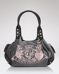 Soft velour, trimmed with leather, gets the royal treatment with a Juicy Couture crest. Soft velour, trimmed with leather, gets the royal treatment with a Juicy Couture crest.