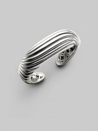 A sensuously curved fluted cuff of polished sterling silver is a fresh take on Yurman's signature cable. Sterling silver Diameter, about 2¼ Width, about 1 Imported A sensuously curved fluted cuff of polished sterling silver is a fresh take on Yurman's signature cable. Sterling silver Diameter, about 2¼ Width, about 1 Imported