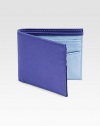 Two-tone design enhances this classic billfold wallet with two pocket sleeves and lends a vibrant, sporty feel.One billfold compartmentSix card slotsLeather4 x 4Imported