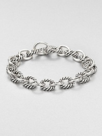 From the Chain Collection. Chunky oval links alternate between cable and smooth in this simple yet sophisticated style.Sterling silverLength, about 7.5Hidden spring clip claspMade in USA From the Chain Collection. Chunky oval links alternate between cable and smooth in this simple yet sophisticated style.Sterling silverLength, about 7.5Hidden spring clip claspMade in USA