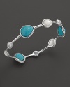 Turquoise stations mingle with clear quartz over mother-of-pearl on this slim silver bangle from the Rock Candy collection by Ippolita.