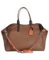 Classic with a contemporary attitude, this season's essential silhouette from Cole Haan is always on-trend. With buttery-soft leather, gleaming hardware and generous interior, it's easy to understand why this carryall is so coveted.