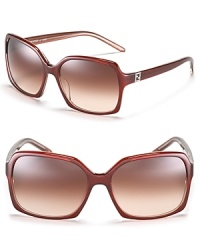 Lounge pool-side in these chic oversized square sunglasses from Fendi. Lounge pool-side in these chic oversized square sunglasses from Fendi.