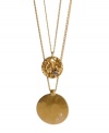 Add shimmer and shine to your neckline. Kenneth Cole New York necklace features two golden discs accented by sparkling glass stones and crystals. Crafted in gold tone mixed metal. Approximate length: 16 inches + 3-inch extender. Approximate drop: 2-1/2 inches.
