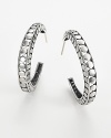 From the Dot collection, silver hoop earrings, designed by John Hardy.