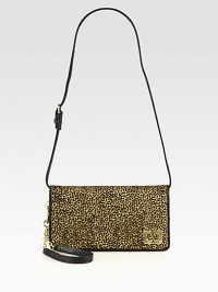 A convertible bag rendered in supple leather and leopard-print calf hair will easily transition from day to night. Adjustable detachable leather shoulder strap, 10½-12½ dropDetachable chain and leather wristlet, 7½ dropMagnetic snap closure on front flapThree inner compartmentsOne inside zip pocketOne inside open pocketCotton lining8W X 4½H X ¾DImported A convertible bag rendered in supple leather and leopard-print calf hair will easily transition from day to night. Adjustable detachable leather shoulder strap, 10½-12½ dropDetachable chain and leather wristlet, 7½ dropMagnetic snap closure on front flapThree inner compartmentsOne inside zip pocketOne inside open pocketCotton lining8W X 4½H X ¾DImported