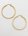 A simply classic, yet relevant design in radiant 18k gold. 18k goldLength, about 1.4Hinged post backMade in Italy