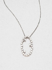 Sparkling white sapphires set in 14k white gold with a open oval design on a delicate link chain. White sapphire14k white goldLength, about 16Pendant size, about .6 Spring ring closureMade in USA