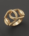 Interlocking bits give this 18K yellow gold ring bold equestrian style.