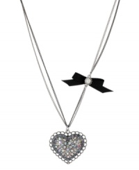Show your love for all things Betsey! Betsey Johnson's sweet pendant necklace features a silver tone heart pendant with clear and blue-colored crystal accents, plus a black grosgrain ribbon with crystal accent. Crafted in rhodium-plated silver tone mixed metal. Approximate length: 16 inches + 3-inch extender. Approximate drop length: 1-3/4 inches. Approximate drop width: 1-3/5 inches. Show your love for all things Betsey! Betsey Johnson's sweet pendant necklace features a silver tone heart pendant with clear and blue-colored crystal accents, plus a black grosgrain ribbon with crystal accent. Crafted in rhodium-plated silver tone mixed metal. Approximate length: 16 inches + 3-inch extender. Approximate drop length: 1-3/4 inches. Approximate drop width: 1-3/5 inches.