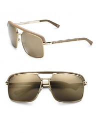 Sleek metal aviators with leather trim. Available in gold with gold mirror lens. 100% UV protection Made in Italy 