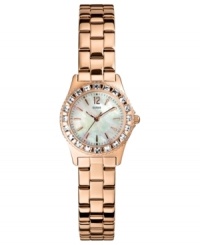 A slim, ladylike watch covered in warm hues, by GUESS. A slim, ladylike watch covered in warm hues, by GUESS.
