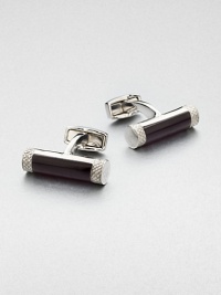Fiber optic glass and brass cuff links lend undeniable style to any dress wardrobe.Brass/glassAbout ¼ diam.Made in the United Kingdom Fiber optic glass and brass cuff links lend undeniable style to any dress wardrobe.Brass/glassAbout ¼ diam.Made in the United Kingdom