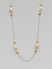 From the Africa Pearl Collection. A delicate link chain with 18k gold and cultured freshwater pearl stations for a look that's both feminine and unique. 18k goldRound white and champagne cultured freshwater pearlsLobster clasp closureLength, about 36Made in Italy