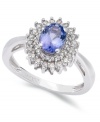 Enhance your look with a burst of sparkle. This stunning 14k white gold ring showcases an oval-cut tanzanite (3/4 ct. t.w.) encircled by two rows of single and full-cut diamonds (1/3 ct. t.w.).