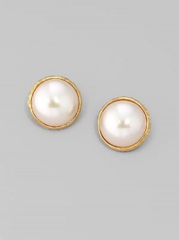 Lustrous white mabé pearls create a look that's simple, timeless and lovely. 16mm organic man-made pearls 18k goldplated sterling silver Clip-on back Made in Spain Lustrous white mabé pearls create a look that's simple, timeless and lovely. 16mm organic man-made pearls 18k goldplated sterling silver Clip-on back Made in Spain