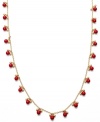 Dot your neck with cute coral. Lauren by Ralph Lauren's mixed metal chain necklace is accented with reconstituted coral beads. Approximate length: 36 inches.