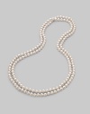 A strand of lustrous white organic pearls goes on and on, down past your waist, to wear long, wrapped or knotted. 8mm white round man-made pearls Length, about 60 Made in Spain