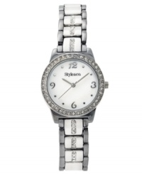 Two metal tones equal two times the glamour on this sparkling watch by Style&co. Gunmetal and silver tone mixed metal bracelet with crystal accents and round case. Bezel embellished with crystal accents. Mother-of-pearl dial features silver tone numerals at twelve, three, six and nine o'clock, dot markers, three hands and logo. Quartz movement. Two-year limited warranty. Two metal tones equal two times the glamour on this sparkling watch by Style&co. Gunmetal and silver tone mixed metal bracelet with crystal accents and round case. Bezel embellished with crystal accents. Mother-of-pearl dial features silver tone numerals at twelve, three, six and nine o'clock, dot markers, three hands and logo. Quartz movement. Two-year limited warranty.