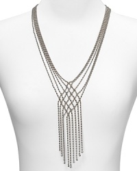 Jazz up your look with this multi strand beaded necklace from ABS bu Allen Schwartz, boasting a woven center and bold fringe detailing. Jazz up your look with this multi strand beaded necklace from ABS bu Allen Schwartz, boasting a woven center and bold fringe detailing.
