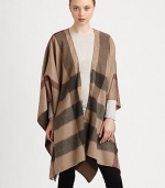 An open front and a loose fit with an iconic check pattern in luxurious cashmere. Open frontThree-quarter kimono sleevesAbout 33 from shoulder to hemCashmereDry cleanImported