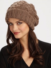 Braided cable stitch knit with ribbed trim in a cool, cozy, slouchy fit. 100% baby alpaca Dry clean Made in USA Braided cable stitch knit with ribbed trim in a cool, cozy, slouchy fit. 100% baby alpaca Dry clean Made in USA
