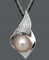 Set sail in this shimmery, summery style. A uniquely-cut pendant resembles a sailboat and shines with the addition of round-cut diamond accents and a pink cultured freshwater pearl center. Set in sterling silver. Approximate length: 18 inches. Approximate drop: 9/10 inch.