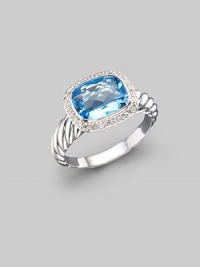 From the Noblesse collection. A glimmering blue topaz, surrounded by diamonds, balances elegantly on a cable band of sterling silver. Diamonds, 0.21 tcw Blue topaz Sterling silver Imported From the Noblesse collection. A glimmering blue topaz, surrounded by diamonds, balances elegantly on a cable band of sterling silver. Diamonds, 0.21 tcw Blue topaz Sterling silver Imported
