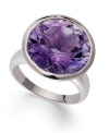 Richly colored with plenty of sparkle, this fun, bright ring features a dramatic round-cut amethyst (10-3/4 ct. t.w.) set in sterling silver. Size 7.