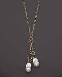 Boldly gleaming baroque freshwater pearls add rich luster to 14K yellow gold. By Nancy B. Boldly gleaming baroque freshwater pearls add rich luster to 14K yellow gold. By Nancy B.