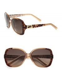 A lightweight, plastic design with metal accented logo temples. Available in classic black with grey gradient lens or leopard brown with grey gradient lens. Logo temples100% UV protectionMade in Italy A lightweight, plastic design with metal accented logo temples. Available in classic black with grey gradient lens or leopard brown with grey gradient lens. Logo temples100% UV protectionMade in Italy