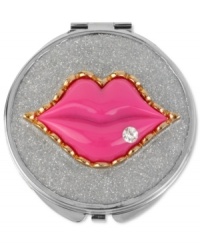 Lip service. Betsey Johnson's compact, crafted from silver-tone mixed metal, glistens with small crystal accents and is quite whimsical. Item comes packaged in a signature Betsey Johnson Gift Box. Approximate length: 3 inches. Approximate width: 3 inches. Lip service. Betsey Johnson's compact, crafted from silver-tone mixed metal, glistens with small crystal accents and is quite whimsical. Item comes packaged in a signature Betsey Johnson Gift Box. Approximate length: 3 inches. Approximate width: 3 inches.