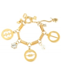 A cut above. Betsey Johnson's multi-charm bracelet is crafted from gold-tone mixed metal with faceted beads and glass crystal accents, adding to the appeal of the charms' cut-out motif. Approximate length: 7-1/2 inches. A cut above. Betsey Johnson's multi-charm bracelet is crafted from gold-tone mixed metal with faceted beads and glass crystal accents, adding to the appeal of the charms' cut-out motif. Approximate length: 7-1/2 inches.