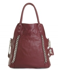 Get twisted: The Twisted foldover purse from Carlos by Carlos Santana piques tons of interest with chain trim and convertible straps. Get twisted: The Twisted foldover purse from Carlos by Carlos Santana piques tons of interest with chain trim and convertible straps.