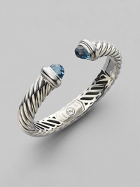 From the Waverly Collection. Cable twisted sterling silver with faceted blue topaz end caps.Blue topaz Sterling silver Width, about 10mm x 5mm Hinge closure Imported From the Waverly Collection. Cable twisted sterling silver with faceted blue topaz end caps.Blue topaz Sterling silver Width, about 10mm x 5mm Hinge closure Imported