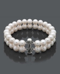 Provide your wardrobe with a timeless piece. This sophisticated bracelet features two rows of pretty cultured freshwater pearls (8-1/2-9-1/2 mm) in a sterling silver setting. Approximate length: 8 inches. Provide your wardrobe with a timeless piece. This sophisticated bracelet features two rows of pretty cultured freshwater pearls (8-1/2-9-1/2 mm) in a sterling silver setting. Approximate length: 8 inches.