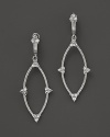 Ornately shaped, these sterling silver earrings from Judith Ripka are accented with white sapphires.