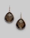 A gorgeous teardrop shape of faceted smoky quartz is set in sterling silver and 18k gold with a fine finish of 18k rose goldplating. Smoky quartz An alloy of 18K gold and sterling silver plated with 18K rose gold Drop, about 1½ Width, about ¾ Ear wire Imported