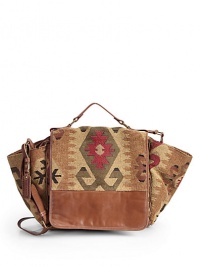 THE LOOKFlat leather top handleAdjustable crossbody strapPush-lock buckle flap closureTapestry fabric construction with leather trimLogo-embossed leather charmOne outside zip pocketTwo inside open pocketsOne inside zip pocketInside logo detailTHE MEASUREMENTTop handle, 4Adjustable crossbody strap, 16-20 drop13½W X 11H X 5DTHE MATERIALTapestry fabricLeather trimLogo printed liningORIGINImported THE LOOKFlat leather top handleAdjustable crossbody strapPush-lock buckle flap closureTapestry fabric construction with leather trimLogo-embossed leather charmOne outside zip pocketTwo inside open pocketsOne inside zip pocketInside logo detailTHE MEASUREMENTTop handle, 4Adjustable crossbody strap, 16-20 drop13½W X 11H X 5DTHE MATERIALTapestry fabricLeather trimLogo printed liningORIGINImported