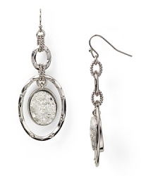 Delicately adorned with clear crystal stones, this pair of hammered dangle earrings from Aqua lend effortless glamor to every look. Delicately adorned with clear crystal stones, this pair of hammered dangle earrings from Aqua lend effortless glamor to every look.